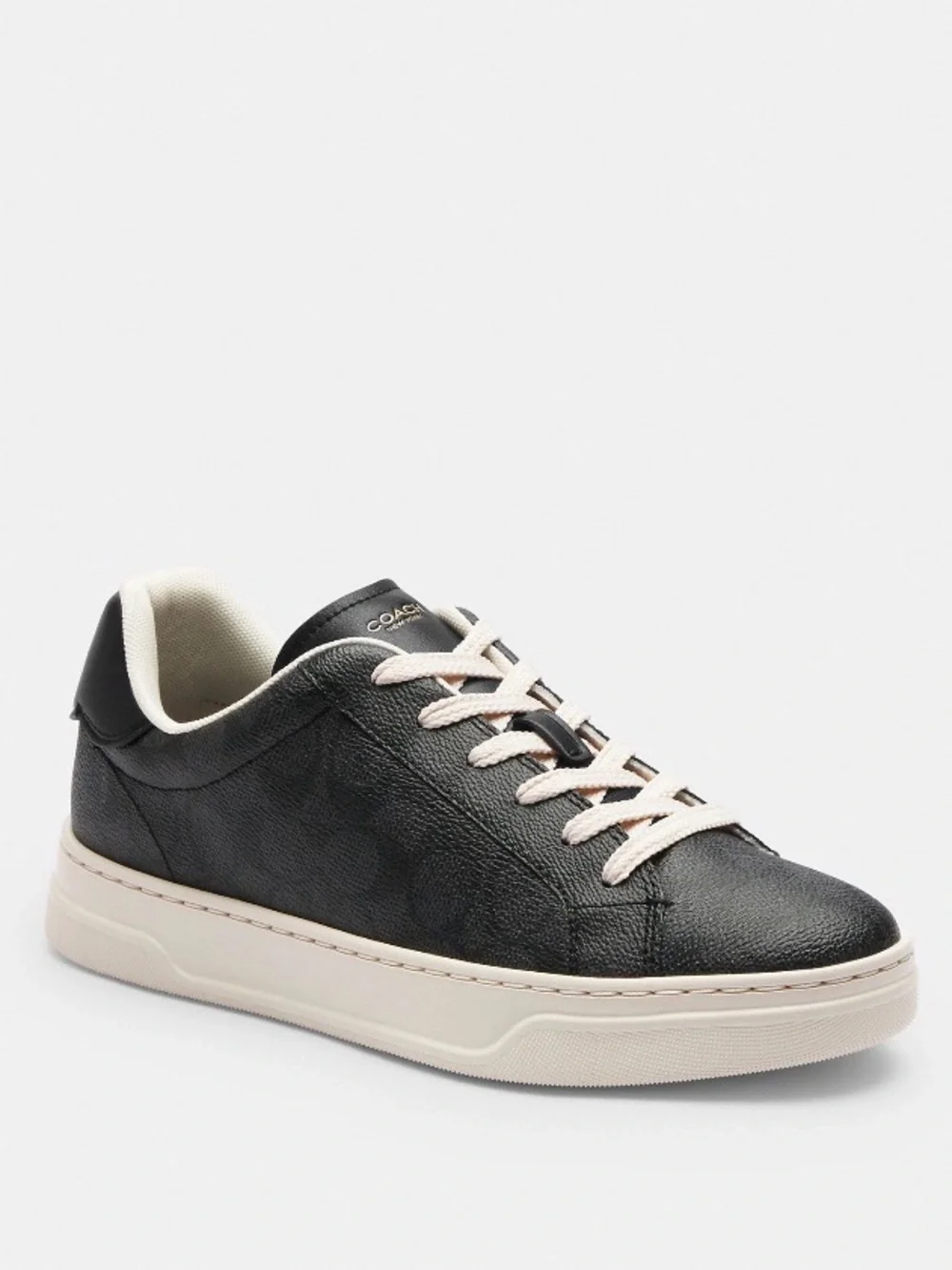 Coach woman’s Black Leather Low-Top Sneaker with Cream Accents